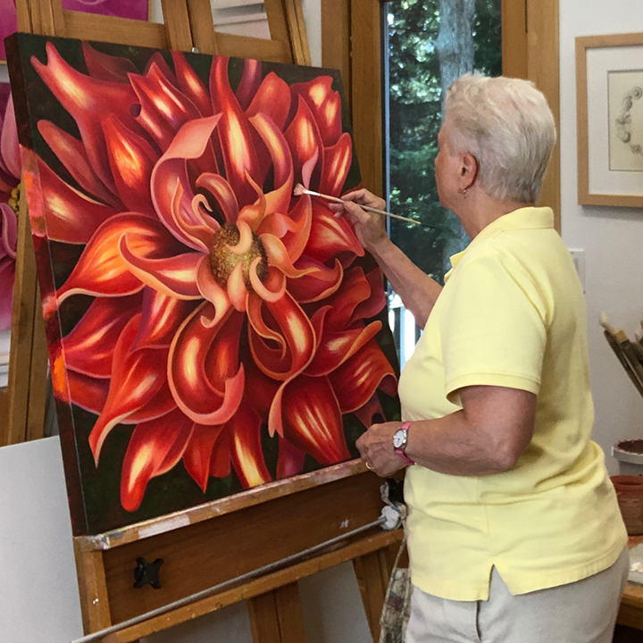 Mary Ahern Painting in her studio.