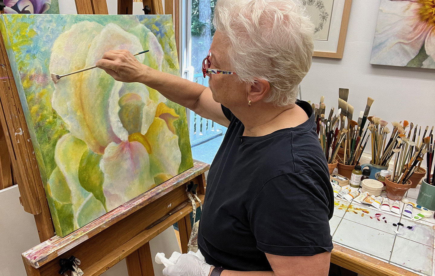 Mary-painting-the white iris in her studio