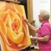 Mary Ahern Painting in the Studio