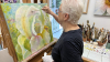 Mary-painting-the white iris in her studio
